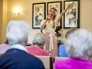 Supporting image for story: Black Country 1920s-style singer entertains care home residents in Arizona
