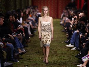 Supporting image for story: Gillian Anderson struts down Paris Fashion Week runway on final day