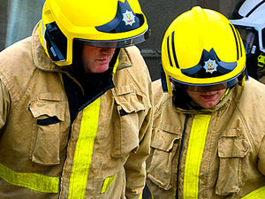 Supporting image for story: Shropshire firefighters and vet work together to sedate and rescue trapped horse