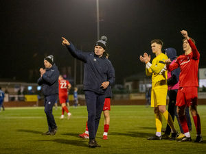 AFC Telford manager Kevin Wilkin celebrates in front of the away fans following the 2-0 victory at Buxton Picture: Kieran Stoddart