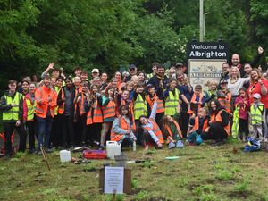 Supporting image for story: West Midlands villagers dig in and plant more than 1,000 shrubs in 'Big Plant Out'