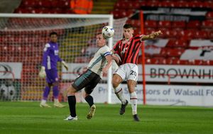 Walsall defender Daniel Cox played 90 minutes in a 2-0 win for Wales under-21s.