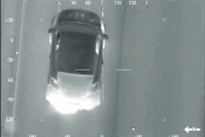 Officers in the helicopter close in