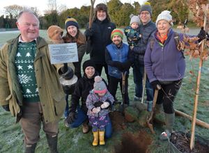 Supporting image for story: 40 people gather in sub-zero temperatures to plant trees on behalf of the late Queen