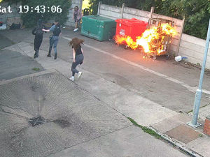 Supporting image for story: Shock pictures show fire at West Midlands petrol station forecourt - metres away from fuel tank - as police arson investigation gets underway