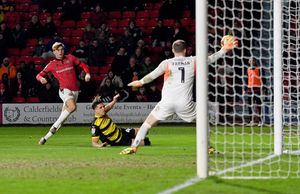 Walsall's Nathan Lowe is denied by Barrow keeper Paul Farman