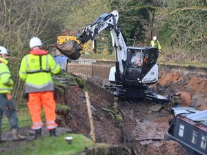 Supporting image for story: WATCH: Digging work under way to prepare for rescue of boats caught in West Midlands canal collapse