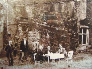 An undated picture of a family outside the rock houses