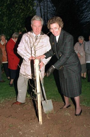 CHAIRMAN OF CHURCH ASTON PARISH COUNCIL, CLR JOHN ATKINS AND MRS MURIEL HILDITCH PLANTED AN OAK TREE IN MEMORY OF CLR WILLLIAM T. HILDITCH IN CHURCH ASTON CHURCH YARD.