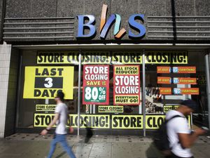 A BHS store with closing down signs in the windows after the retailer's collapse