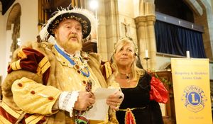 Henry VIII with Lions President Debra Coburn as Anne Boleyn