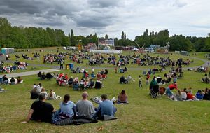 Football fans watch the match on the big screen. Photo: Tim Thursfield