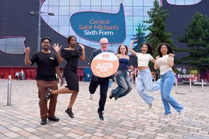 Richard Parker helps students celebrate their success