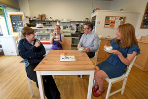 Trinity churches host a cafe connect every day at Radbrook, Shrewsbury. Pictured are Revs Phil Cansdale and Fiona Iddon, enjoying a coffee with cafe assistant Charlotte Tonks and her son Milo Tonks, aged 12