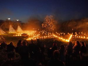 Crowds watch illuminations during the Bealtaine Fire Festival at the Hill of Uisneach in Co Westmeath