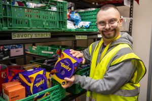 Dale packing away some of the Easter eggs gifted by David Wilson Homes