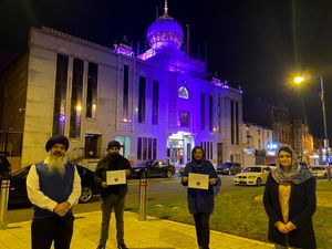 Supporting image for story: Sikh temple turns purple to raise awareness of domestic violence