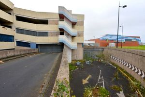 The former car park which once served Queens Square shopping centre is now closed