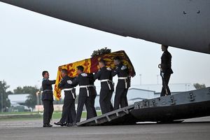 The bearer party from the Queen’s Colour Squadron (63 Squadron RAF Regiment) carry the coffin of The Queen
