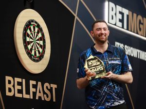 Luke Humphries with the trophy