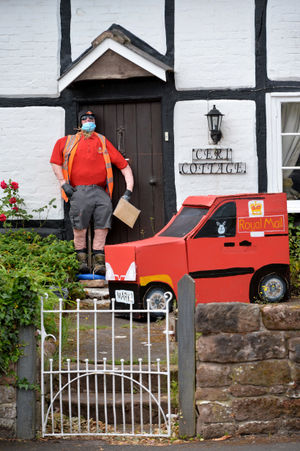 Hinstock is holding a scarecrow trail to keep kids entertained and raise money for good causes. The theme is 'lockdown heroes'. Pictured, postman hero