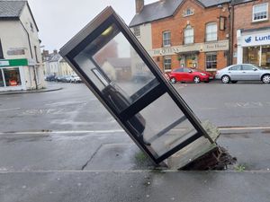 Supporting image for story: 'Leaning phone box of Ludlow' provides short-lived artistic attraction after truck knocks box askew