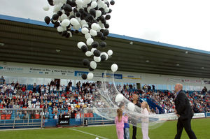 Former Telford United favourite Anton Joseph and Lee Carter release over 100 balloons into the sky before the game.