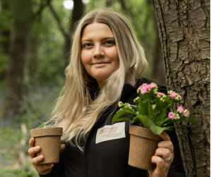 Molly Ratcliffe with the biodegradable plant pots. Pic:@mattpgraphy2 