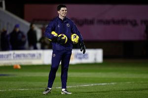 Harry Burgoyne helped Matt Cox with pre-match routines