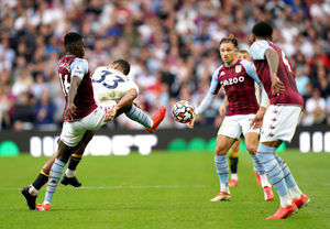 Aston Villa's Axel Tuanzebe (left) and Everton's Salomon Rondon