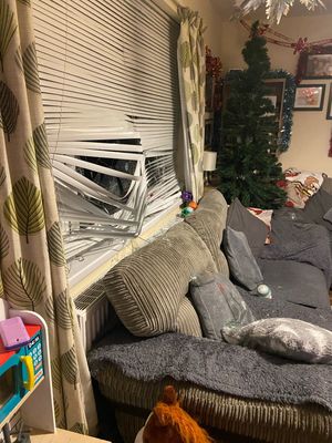 The brick was thrown through the lounge window, above the sofa when Kelly's one-year-old child was sleeping. 