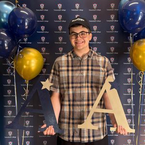 Trystan celebrates his excellent A Level results and prepares for higher education at the University of Bristol. 