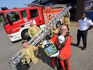 Supporting image for story: Firefighters give Shrewsbury mayor a lift
