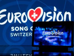 The Eurovision Song Contest 2025 logo displayed on a tablet