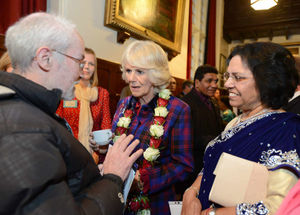 The Duchess of Cornwall, speaks to (left) CHarles Searson, from the Good Shepherd Ministry in Wolverhampton, at the Royal School, Wolverhampton
