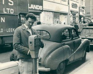 ... . .. The bank holiday seemed to have passed David Rathbone of Blakenhall by when pictured in April, 1969. Unsuspecting motorists were feeding Wolverhampton's parking meters, not realising chargeds had been lifted. LETTS AUG 27