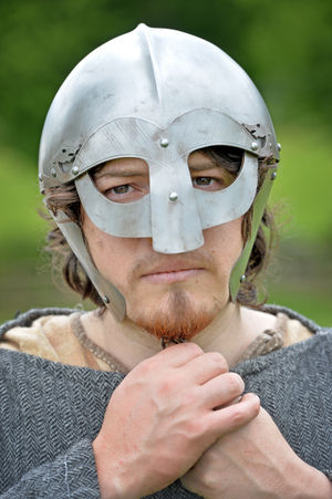 Alex Pettit demonstrates a Viking helmet