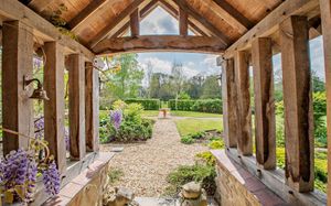 Walnut Tree Cottage sits in more than six acres of gardens and paddocks which include an orchard. Picture: Savills.