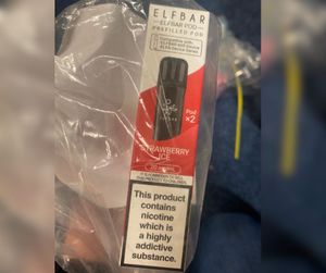 A vape showing nicotine warning