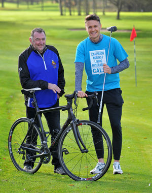 Louis Birchall with golf club captain Mike Shewan