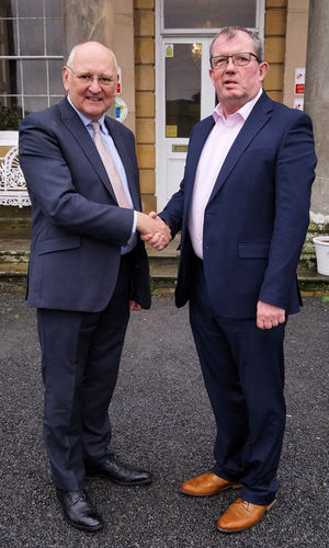 MWT Cymru’s retiring chairman Rowland Rees-Evans (left) with his successor, Dylan Roberts
