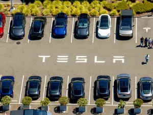 Supporting image for story: Tesla profits plunge despite selling more vehicles in past three months