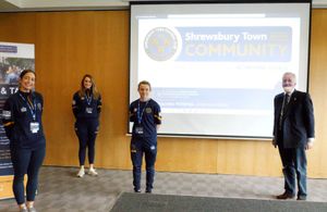 High Sheriff of Shropshire, Tony Morris-Eyton, with some of the Shrewsbury Town in the Community team at the Montgomery Waters Meadow.