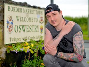 Supporting image for story: 'Respect' spat over hat-wearing tattooed town councillor