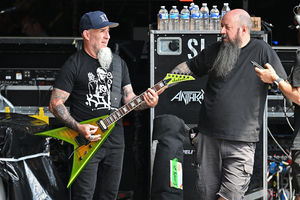 A member of US rock band Anthrax, Scott Ian (L) on stage as preparations continue on the eve of British rock band, Black Sabbath's "Back to the Beginning" concert, Ozzy Osbourne's final ever gig as Black Sabbath's frontman at Villa Park in Birmingham, central England on July 4, 2025. Osbourne, who revealed in 2020 that he has Parkinson's disease, will join Tony Iommi, Geezer Butler and Bill Ward for the all-day "Back To The Beginning" show in Birmingham, central England, where the heavy metal giants formed in 1968. (Photo by ANDY BUCHANAN / AFP) (Photo by ANDY BUCHANAN/AFP via Getty Images)          