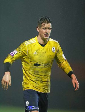 A wind swept and wet Neill Byrne of AFC Telford United at the final whistle