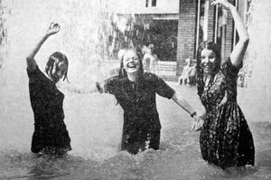 Shrewsbury teenagers steal a swim in the Shirehall ornamental pool, not long after the building was opened in 1969 (Shropshire Star archive)