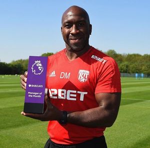 Moore with his award.