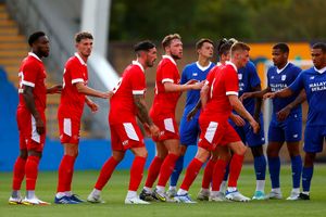 Shrewsbury players line-up for a set-piece (AMA)