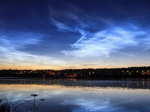 Supporting image for story: The bleak reason behind beautiful night-shining clouds, according to science